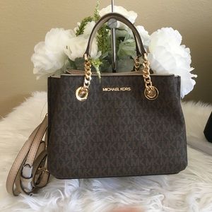 teagen small pebbled leather messenger bolsa